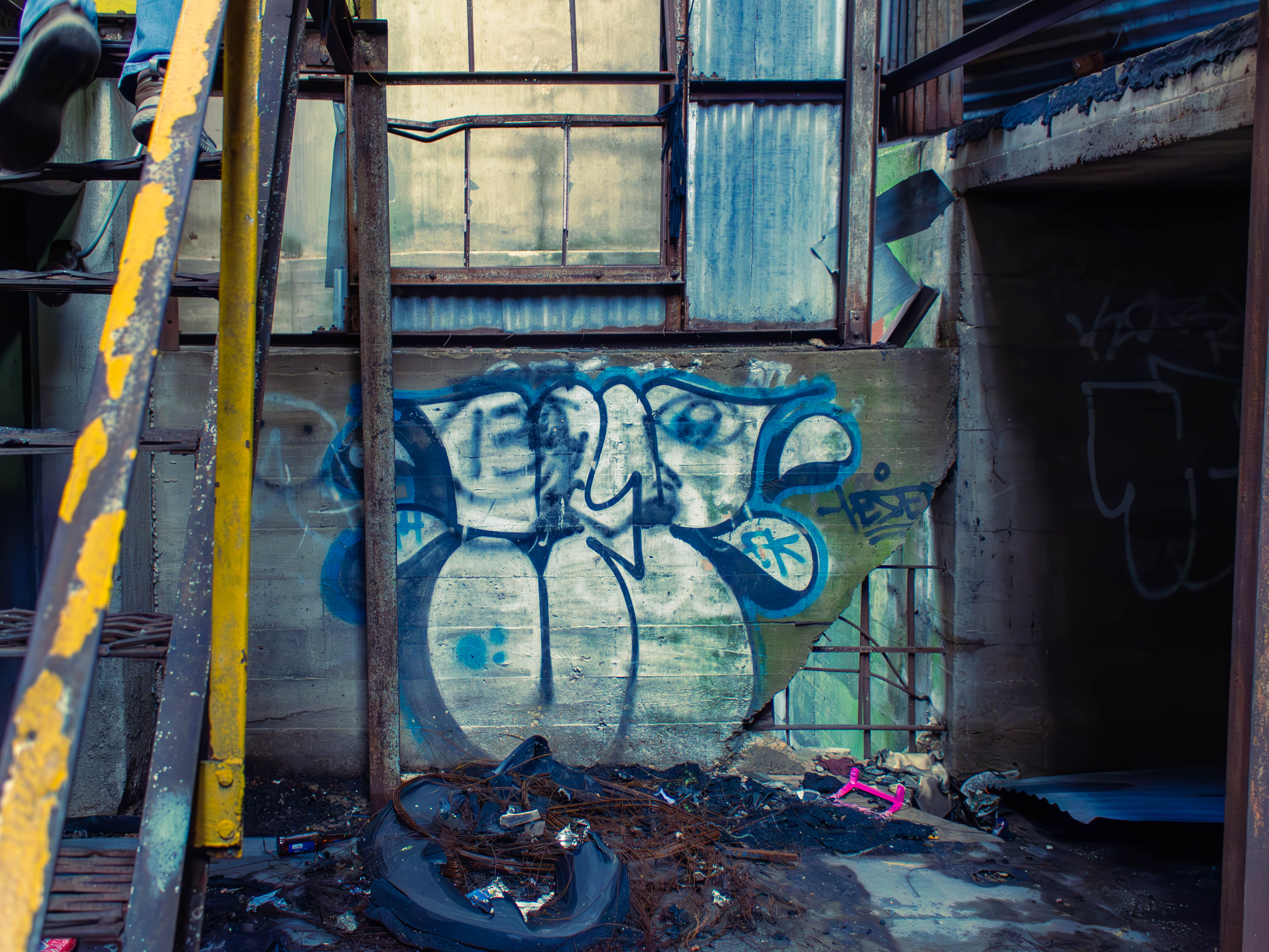 A picture of graffiti in an abandoned grain elevator